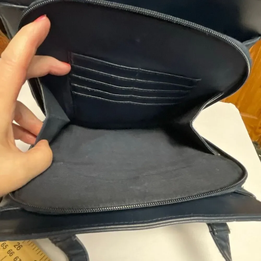 Vintage Colette blue leather shoulder bag.